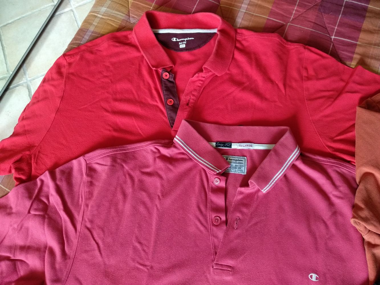 tuta champion nera e rossa